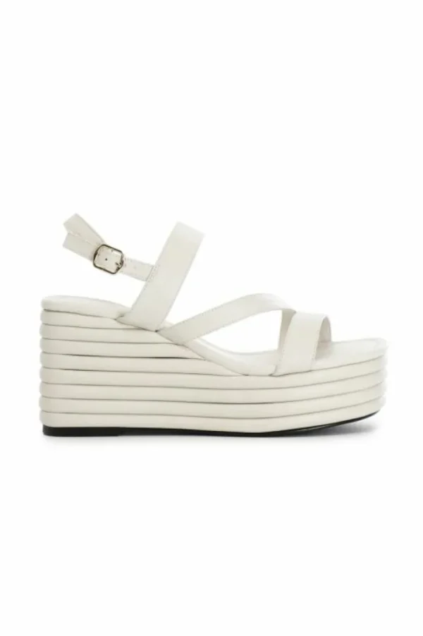 CafèNoir sandali asimmetrici in nappa con zeppa effetto imbottito